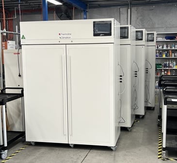 Four Thermoline plant growth cabinets being prepared for arabidopsis research